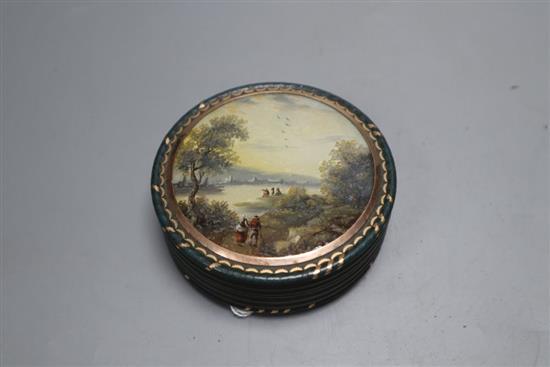 An early 19th century French bois durci snuff box, diameter 3in.